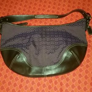 Coach material and leather bag